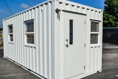 A white container with windows and door.