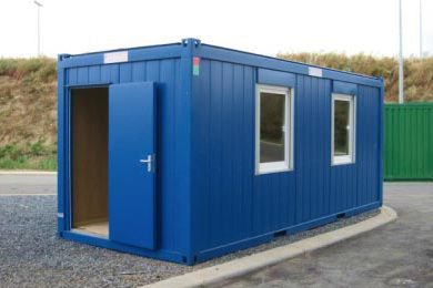 A blue container with windows and doors.